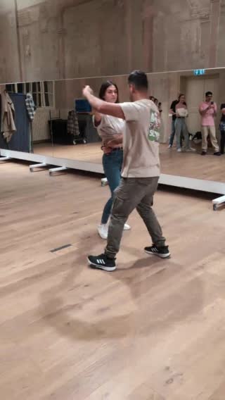 Under arm into behind